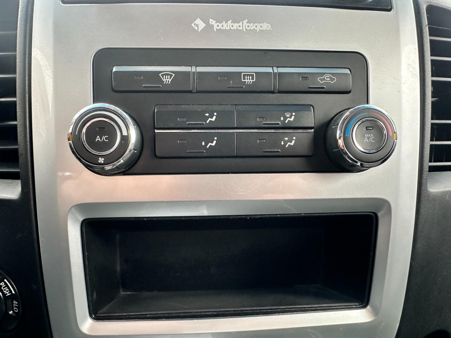 2013 White /Black Nissan Titan Pro-4X (1N6AA0EC0DN) with an 5.6L DOHC 32V V8 engine, Automatic transmission, located at 547 E. Main St., Orwell, OH, 44076, (440) 437-5893, 41.535435, -80.847855 - This 2013 Nissan Titan Pro-4X Crew Cab is a capable and well-equipped full-size pickup truck. It features a powerful 5.6L Endurance V8 engine paired with a 5-speed automatic transmission, a locking rear differential for improved traction, and a maximum towing capacity of 9,300 pounds. The truck is l - Photo#19